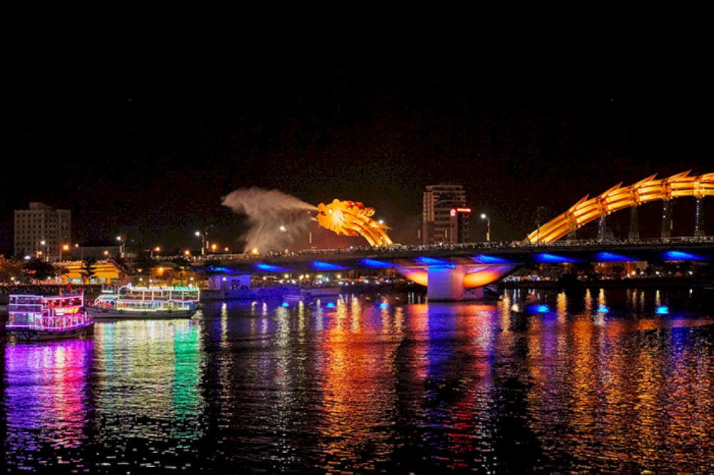 Dragon Bridge sprays water at night